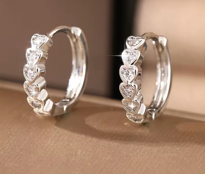 Sterling Silver Petite CZ Heart Clicker Hoop Earrings.