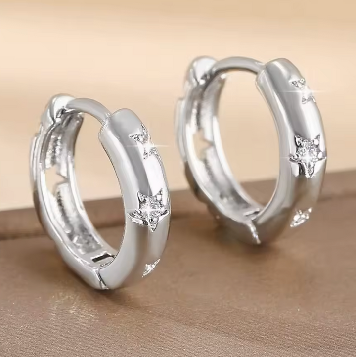 Sterling silver Star CZ Cluster Hoop Earrings.