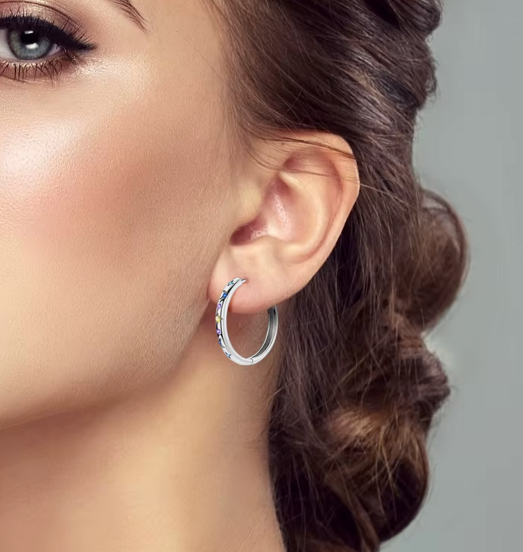 Sterling Silver Astral Hoop Clicker Earrings.